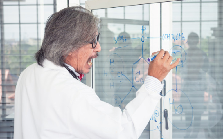 Professor doctor writing on the glass bilboard - See Far smart glasses